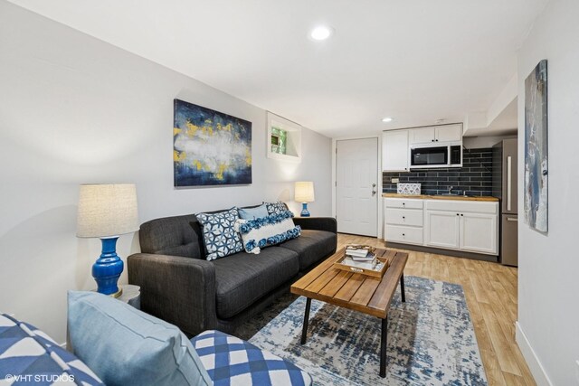 5247 N California Ave, Chicago, IL 60625 - living room with light wood finished floors and recessed lighting