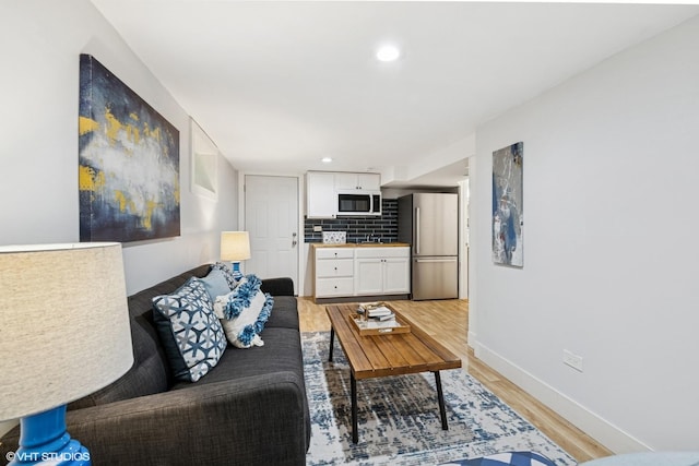 5247 N California Ave, Chicago, IL 60625 - living area with light wood finished floors and recessed lighting
