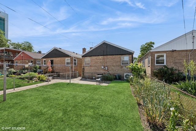 5247 N California Ave, Chicago, IL 60625 - back of house with brick siding and a patio area