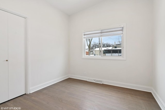 316 Nellie Ct, Glenview, IL 60025 - unfurnished bedroom with wood finished floors and a closet