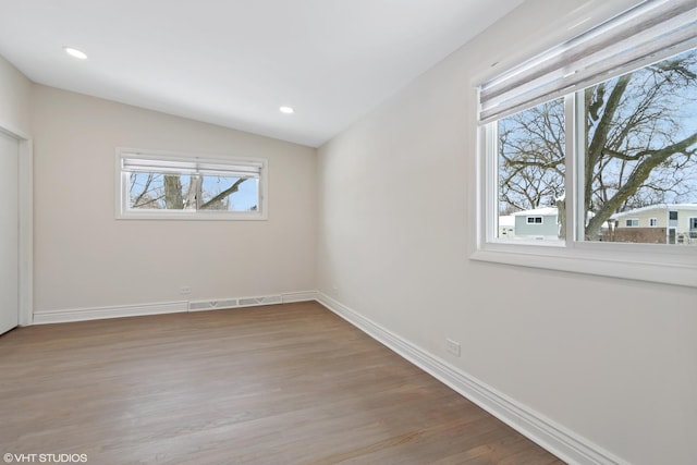 316 Nellie Ct, Glenview, IL 60025 - unfurnished bedroom featuring wood finished floors, lofted ceiling, and recessed lighting