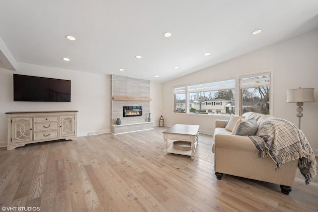 316 Nellie Ct, Glenview, IL 60025 - living room featuring light wood-style flooring, recessed lighting, a fireplace, and lofted ceiling
