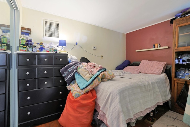 392 Plum Ct, Elgin, IL 60120 - bedroom featuring ornamental molding and wood finished floors