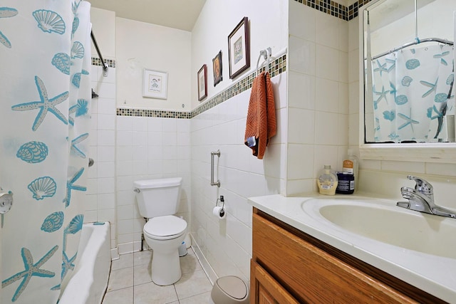 392 Plum Ct, Elgin, IL 60120 - bathroom featuring tile walls, tile patterned floors, vanity, and shower / bath combo
