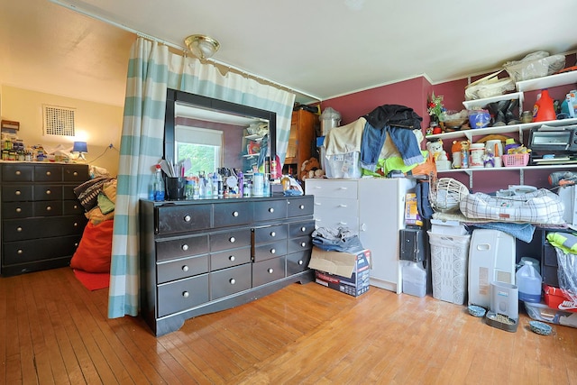 392 Plum Ct, Elgin, IL 60120 - bedroom with hardwood / wood-style flooring