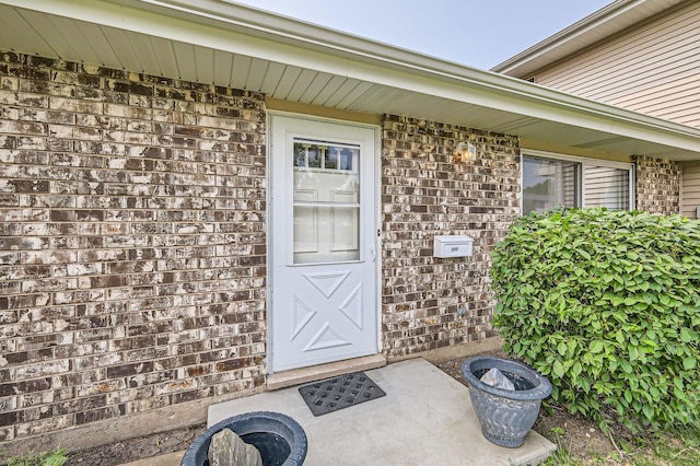 117 Cotuit Ct Unit 117, Schaumburg, IL 60193 - view of exterior entry with brick siding