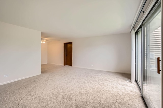 117 Cotuit Ct Unit 117, Schaumburg, IL 60193 - empty room featuring carpet floors and a ceiling fan