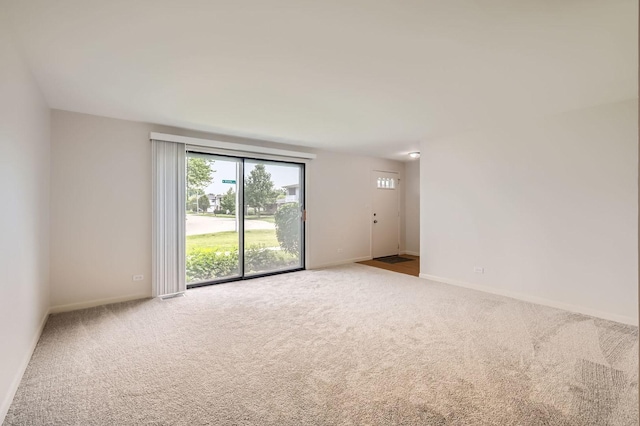 117 Cotuit Ct Unit 117, Schaumburg, IL 60193 - carpeted empty room with baseboards