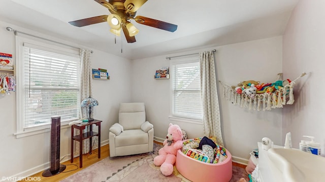 1910 N 76th Ct, Elmwood Park, IL 60707 - game room featuring ceiling fan, wood finished floors, and baseboards