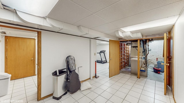 1910 N 76th Ct, Elmwood Park, IL 60707 - finished below grade area with light tile patterned floors and heating unit