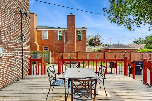 1910 N 76th Ct, Elmwood Park, IL 60707 - wooden deck with a fenced backyard and outdoor dining space