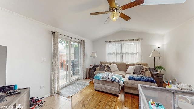 1910 N 76th Ct, Elmwood Park, IL 60707 - living room with a ceiling fan, vaulted ceiling, baseboards, and wood finished floors