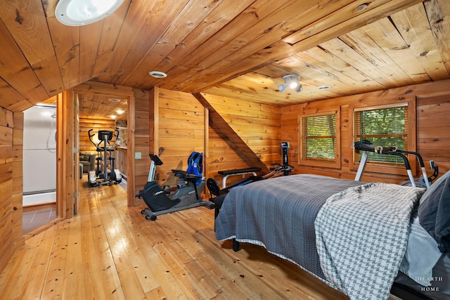 8753 Camp Lake Rd, Salem, WI 53168 - bedroom featuring wood ceiling, wooden walls, light wood finished floors, and a baseboard heating unit