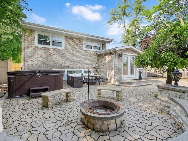 400 E Garwood Ave, Mount Prospect, IL 60056 - view of patio with a hot tub, french doors, and an outdoor fire pit