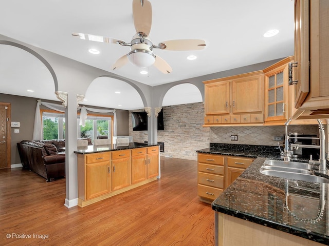 400 E Garwood Ave, Mount Prospect, IL 60056 - kitchen with light wood finished floors, backsplash, ceiling fan, glass insert cabinets, and recessed lighting
