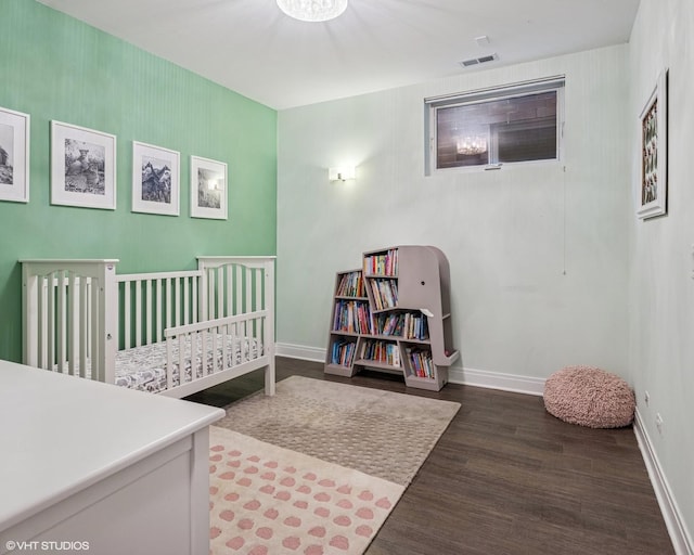 1350 W Diversey Pkwy Unit 1, Chicago, IL 60614 - bedroom with wood finished floors and a nursery area