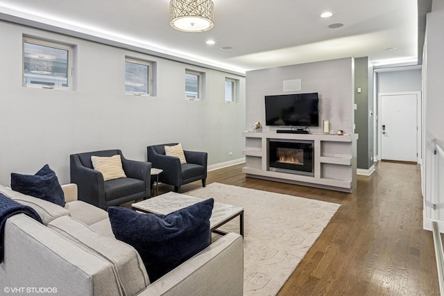 1350 W Diversey Pkwy Unit 1, Chicago, IL 60614 - living room featuring dark wood-type flooring, recessed lighting, and a glass covered fireplace