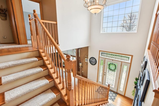 949 Ruthenbeck Ln, New Lenox, IL 60451 - entryway with a towering ceiling, wood finished floors, and stairs