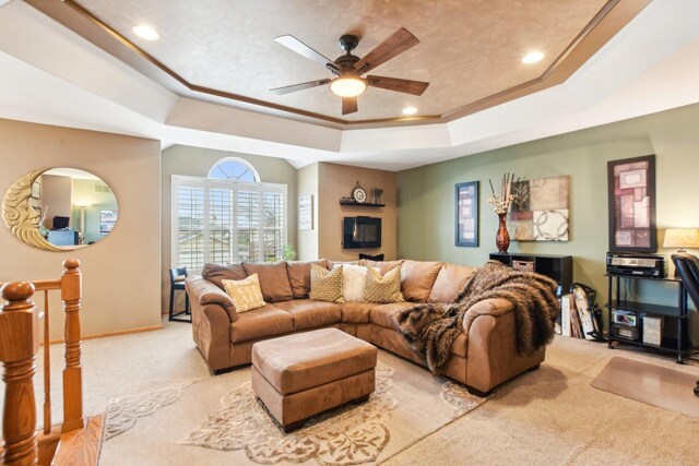 949 Ruthenbeck Ln, New Lenox, IL 60451 - living area with a raised ceiling, light carpet, ceiling fan, recessed lighting, and ornamental molding
