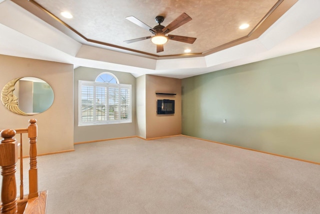 949 Ruthenbeck Ln, New Lenox, IL 60451 - unfurnished room with a tray ceiling, ceiling fan, carpet, and recessed lighting