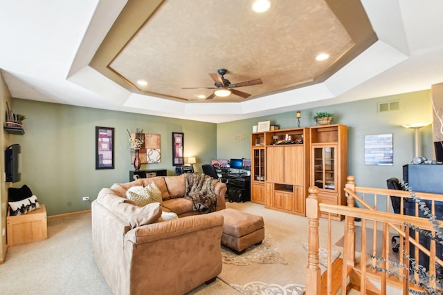 949 Ruthenbeck Ln, New Lenox, IL 60451 - living room with light colored carpet, an office area, a raised ceiling, a ceiling fan, and recessed lighting