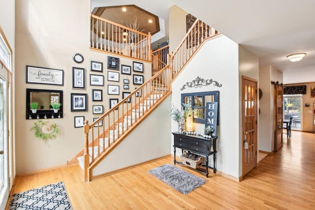 949 Ruthenbeck Ln, New Lenox, IL 60451 - stairway featuring wood finished floors and a towering ceiling