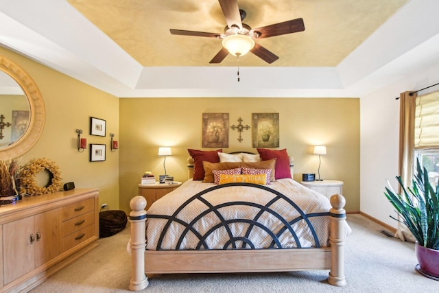 949 Ruthenbeck Ln, New Lenox, IL 60451 - bedroom with a tray ceiling, light colored carpet, and ceiling fan