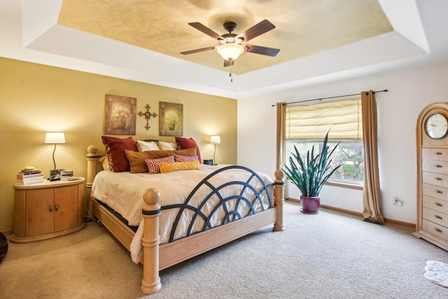 949 Ruthenbeck Ln, New Lenox, IL 60451 - bedroom with a tray ceiling, light colored carpet, and ceiling fan