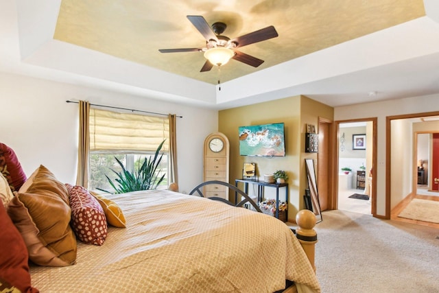 949 Ruthenbeck Ln, New Lenox, IL 60451 - carpeted bedroom with a tray ceiling and a ceiling fan
