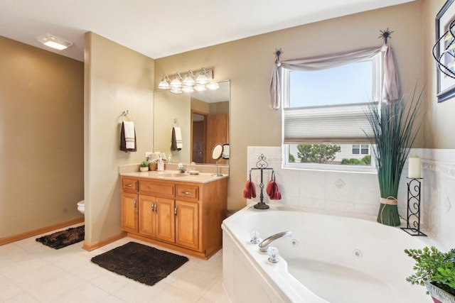 949 Ruthenbeck Ln, New Lenox, IL 60451 - bathroom featuring vanity, a jetted tub, and tile patterned floors