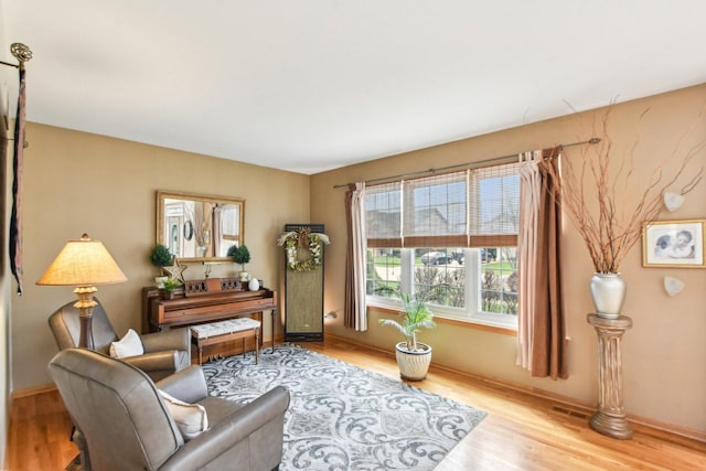 949 Ruthenbeck Ln, New Lenox, IL 60451 - sitting room featuring wood finished floors and baseboards