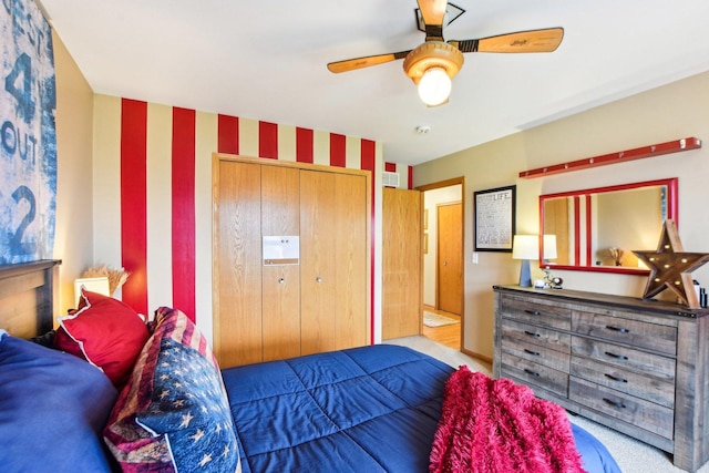 949 Ruthenbeck Ln, New Lenox, IL 60451 - carpeted bedroom with a closet, ceiling fan, and wallpapered walls