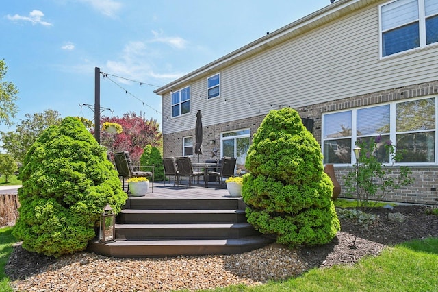 949 Ruthenbeck Ln, New Lenox, IL 60451 - rear view of house featuring a wooden deck and brick siding