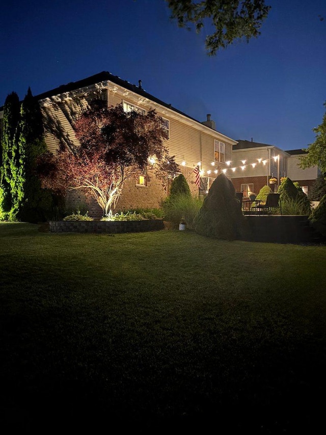 949 Ruthenbeck Ln, New Lenox, IL 60451 - yard at night with a yard