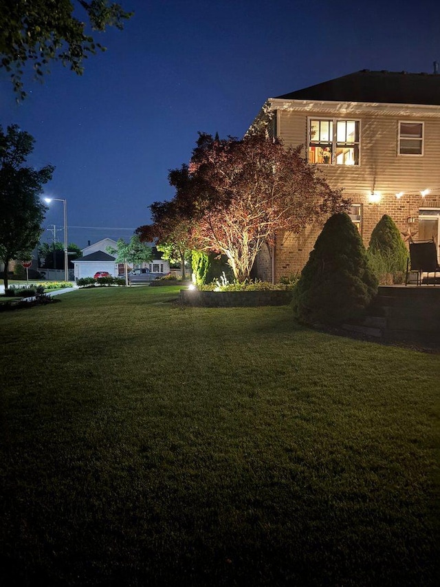 949 Ruthenbeck Ln, New Lenox, IL 60451 - yard at night with a lawn