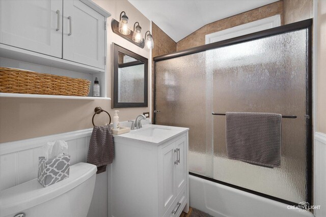 124 Fairview Dr, Saint Charles, IL 60174 - full bath with vanity, shower / bath combination with glass door, and vaulted ceiling