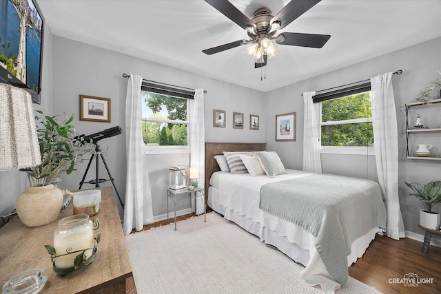 124 Fairview Dr, Saint Charles, IL 60174 - bedroom featuring multiple windows, wood finished floors, and a ceiling fan