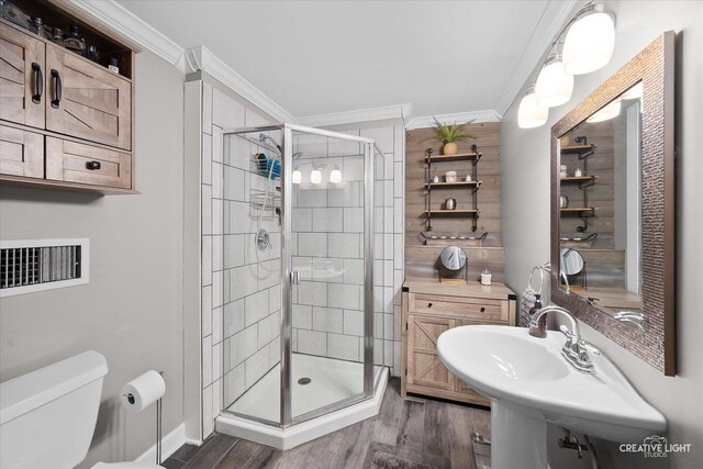 124 Fairview Dr, Saint Charles, IL 60174 - bathroom with ornamental molding, a shower stall, and wood finished floors