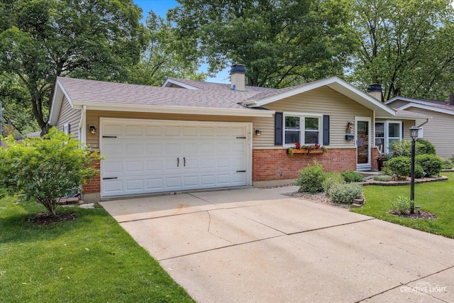 124 Fairview Dr, Saint Charles, IL 60174 - single story home with brick siding, an attached garage, concrete driveway, a chimney, and a front lawn