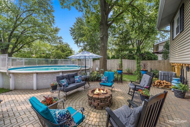 124 Fairview Dr, Saint Charles, IL 60174 - view of patio / terrace with an outdoor living space with a fire pit