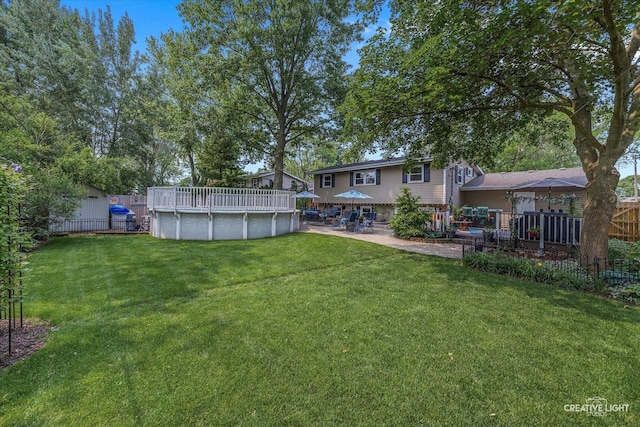 124 Fairview Dr, Saint Charles, IL 60174 - view of yard featuring an outdoor pool and a patio area