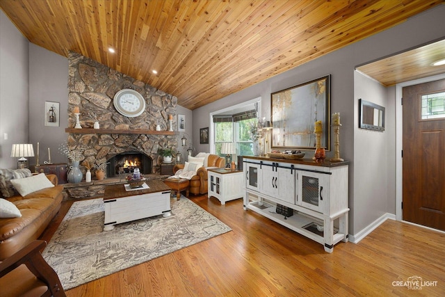 124 Fairview Dr, Saint Charles, IL 60174 - living area with vaulted ceiling, wooden ceiling, a fireplace, healthy amount of natural light, and wood finished floors