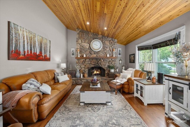 124 Fairview Dr, Saint Charles, IL 60174 - living room with lofted ceiling, wooden ceiling, wood finished floors, and a stone fireplace