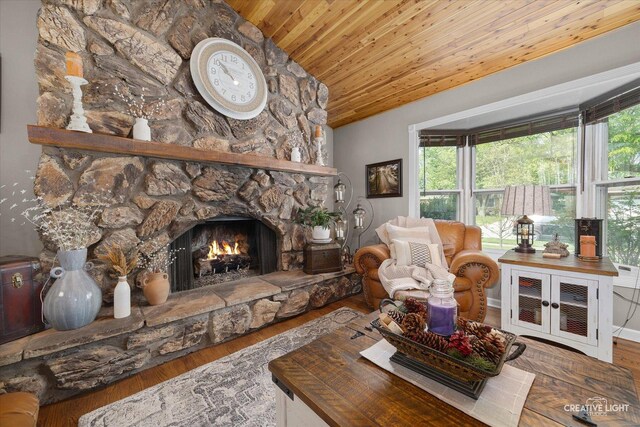 124 Fairview Dr, Saint Charles, IL 60174 - living area with lofted ceiling, wood finished floors, wood ceiling, a fireplace, and healthy amount of natural light