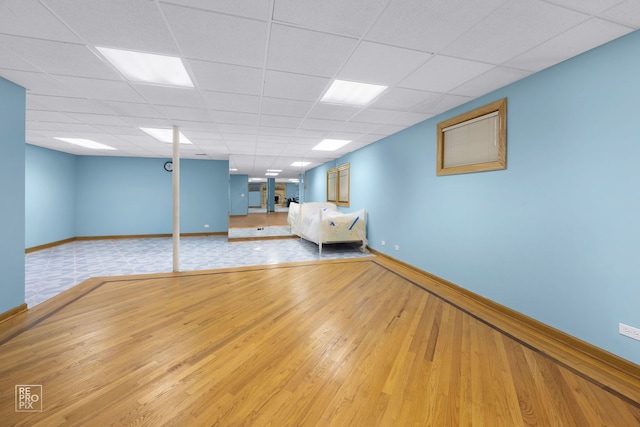 401 Jason Ln, Schaumburg, IL 60173 - unfurnished bedroom featuring light wood-style floors and a drop ceiling
