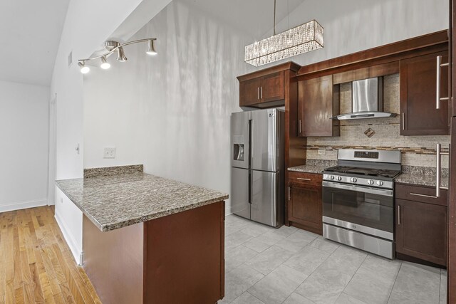 3S261 Briarwood Dr, Warrenville, IL 60555 - kitchen featuring appliances with stainless steel finishes, wall chimney range hood, a peninsula, decorative backsplash, and light stone counters