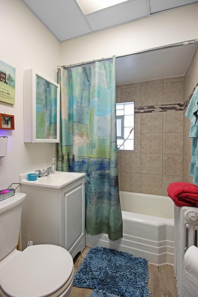 2424 Birch Ave, Whiting, IN 46394 - full bathroom with vanity, wood finished floors, and shower / bath combo