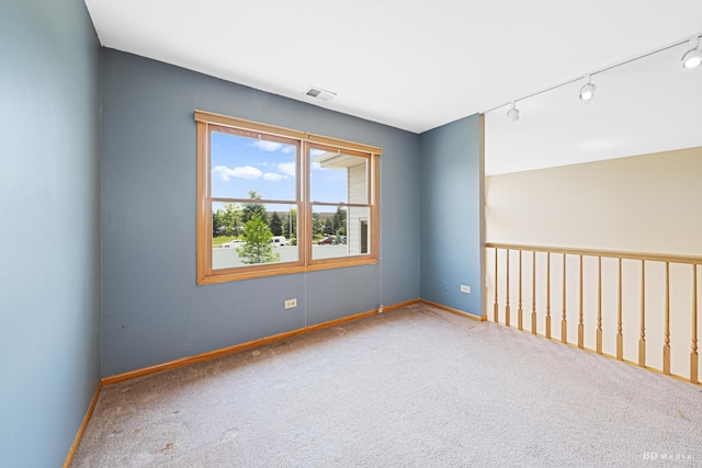 9963 Constitution Dr, Orland Park, IL 60462 - carpeted empty room featuring track lighting and baseboards