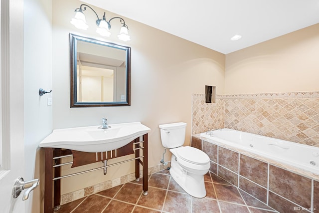 9963 Constitution Dr, Orland Park, IL 60462 - bathroom featuring a jetted tub, tile patterned flooring, and vanity