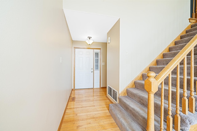 9963 Constitution Dr, Orland Park, IL 60462 - entryway with stairway and light wood-type flooring